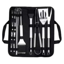 BBQ tool kit in a black carrying bag with stainless utensils laid out