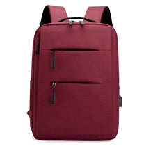 Pink baby travel diaper bag with top handle and front zip pockets