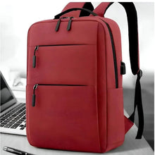 Pink diaper bag backpack with padded straps, front zip pocket, and side handle