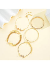 Huitich adjustable gold crystal bracelet set featuring four elegant gold-tone bracelets with crystals