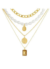 Gold-tone pearl and chunky chain necklace set with oval, tag, and rectangle pendants