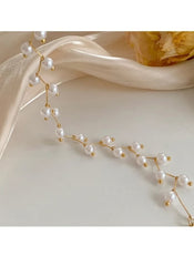 Elegant faux pearl branch necklace by Huitich with delicate gold-tone wire and white pearls