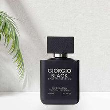 Men's eau de parfum bottle with dark square cap and black label, 100ml