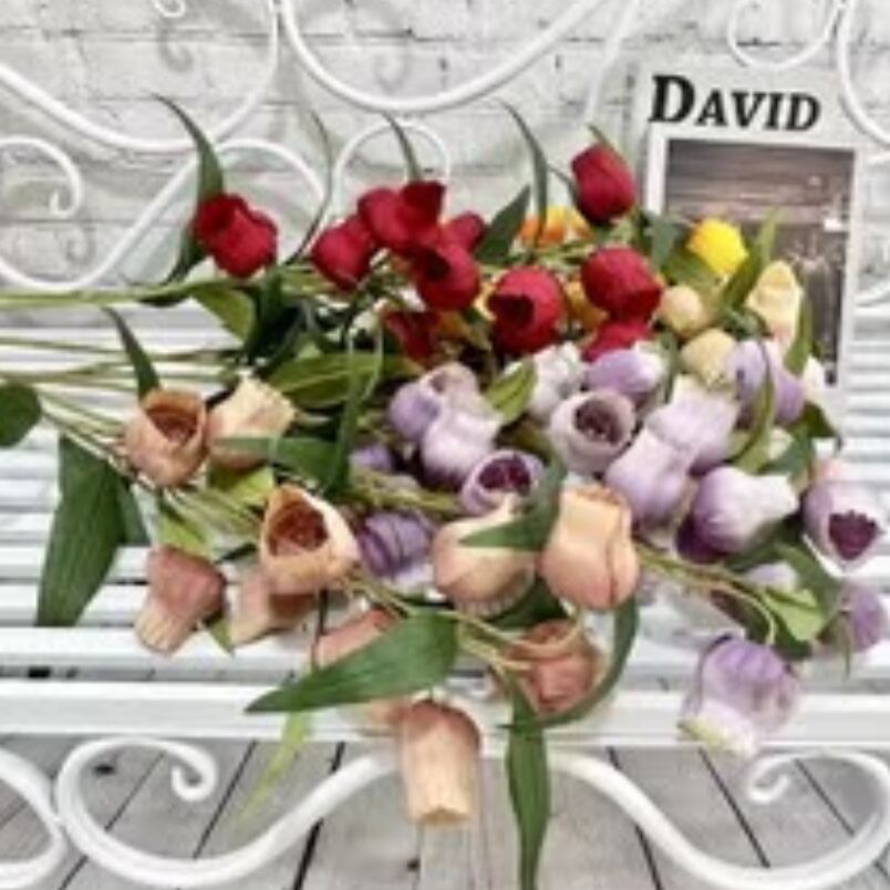 Huitich artificial flowers bouquet with red, purple, and beige blooms displayed on white bench gold and green chopstick holder