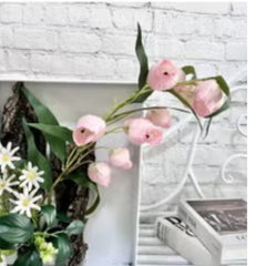 Huitich artificial flowers with pink blooms and green leaves displayed near gold and green chopstick holder