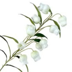 Huitich artificial flowers with white bell-shaped blooms and green leaves next to gold and green chopstick holder
