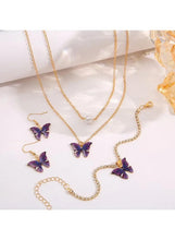 Gold-tone butterfly jewelry set with purple charm necklace, butterfly earrings, and bracelet chain