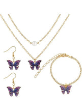 Gold-tone butterfly jewelry set with purple charm necklace, earrings, and bracelet