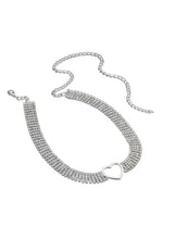 Silver rhinestone heart choker necklace with layered chain, curved sparkle band.
