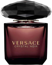 Square perfume bottle with dark maroon tint, black base, and gold Versace Crystal Noir text