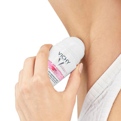 Vichy 48 hour deodorant for women being applied to underarm for effective odor protection