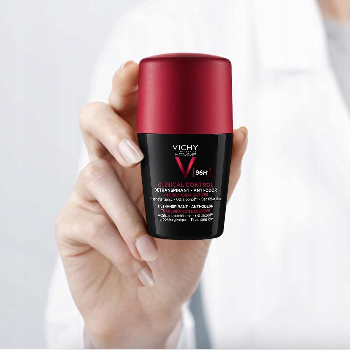 Vichy 96 hour men deodorant in a sleek black bottle with red cap, offering long-lasting protection