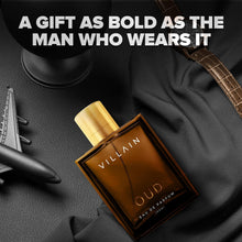 Oud eau de parfum bottle with gold cap beside dark box on textured surface