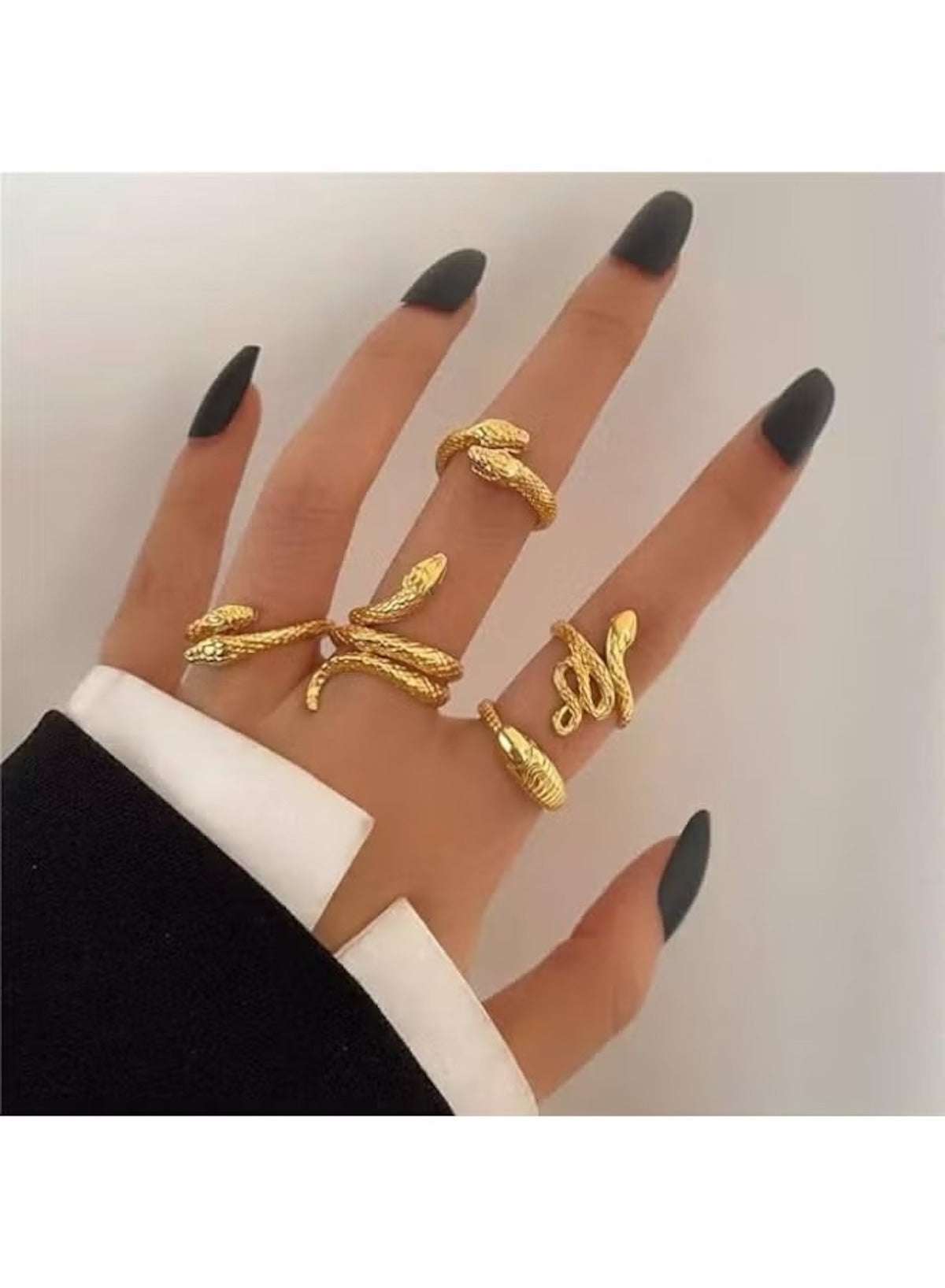 Huitich vintage gold snake ring set displayed on a woman's hand with stylish black nails