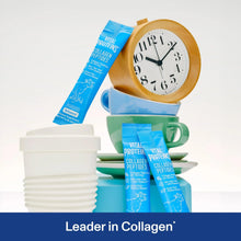 Vital Proteins collagen peptides travel sachet packs beside green and blue cups