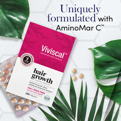 Viviscal hair growth supplement for women box with blister tablets and green leaves highlighting AminoMar C formula