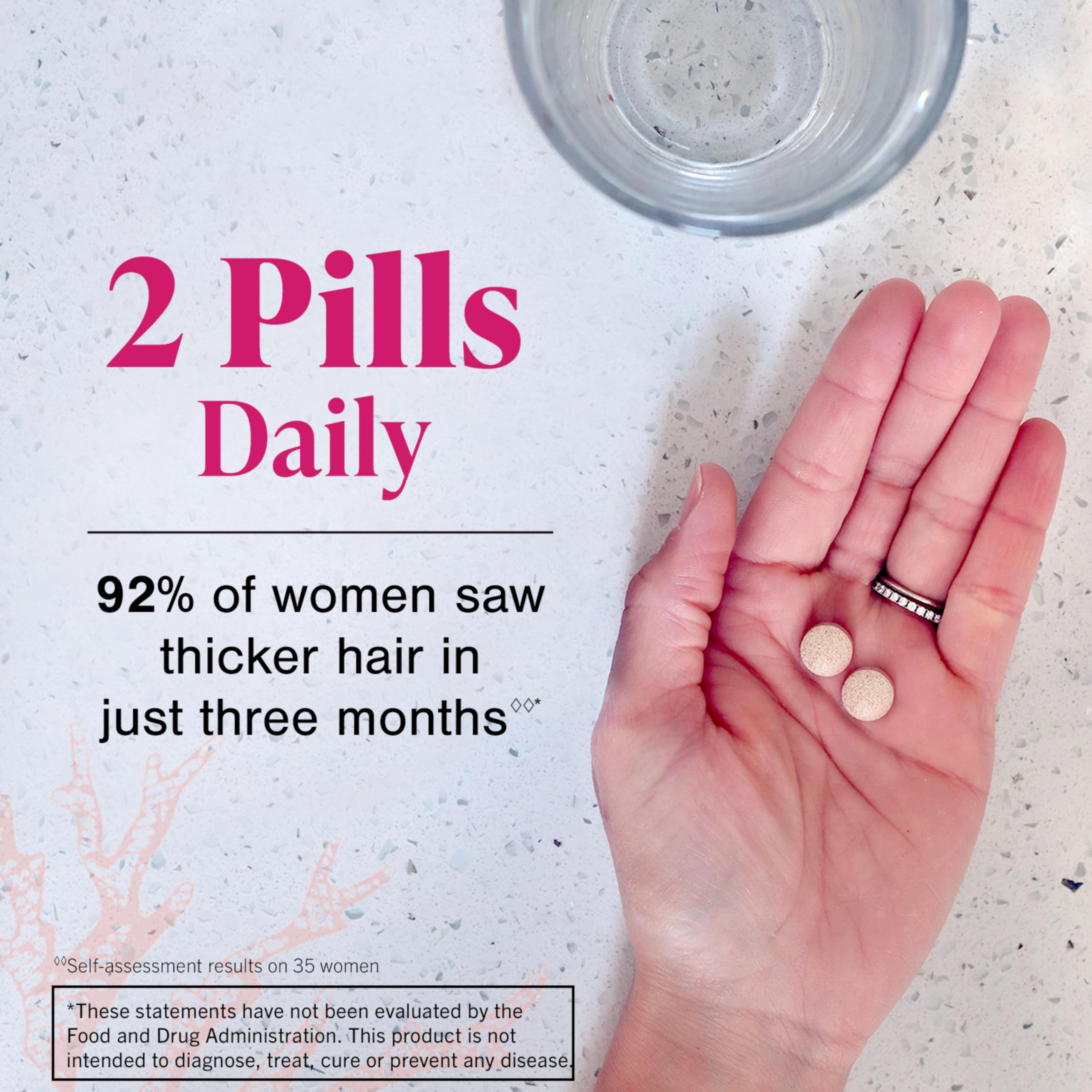 Hand holding two pills next to a glass of water with 2 Pills Daily text promoting Viviscal hair growth supplement for women