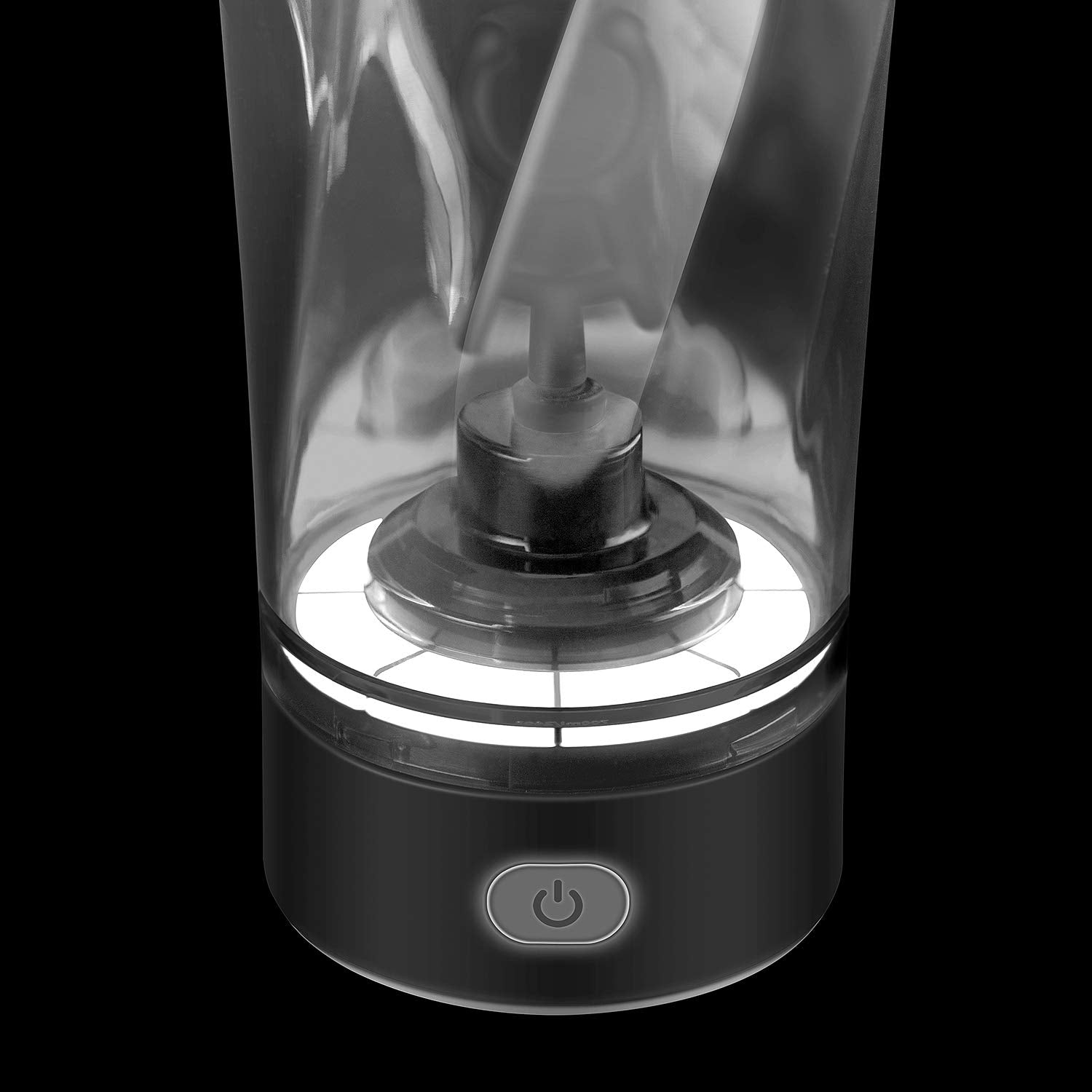 VOLTRX electric protein shaker bottle showing clear mixing chamber with LED base and power button