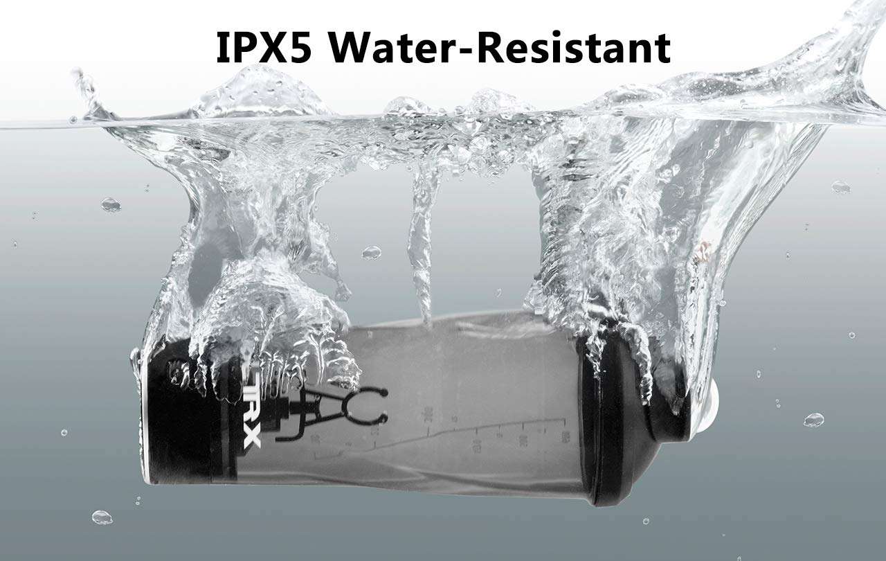 VOLTRX electric protein shaker bottle gray with black lid submerged in splashing water showing IPX5 water resistant