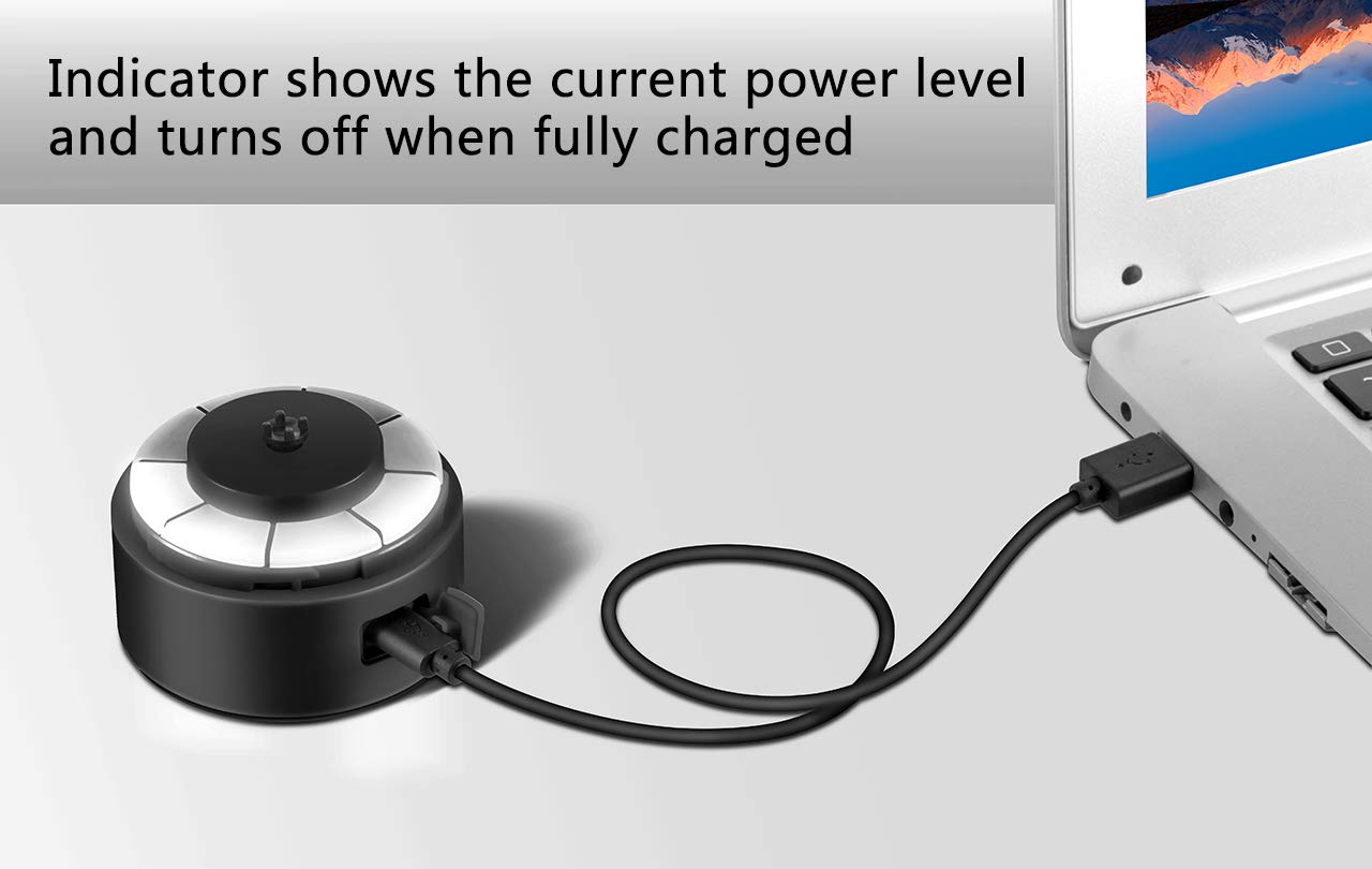 VOLTRX electric protein shaker bottle USB charging base connected to laptop with power indicator