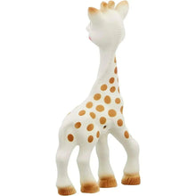 White rubber giraffe teether with orange-brown spots and small horns