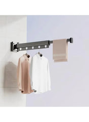 Wall-mounted folding hanger with 5 hooks holding light shirts, side mounting knob