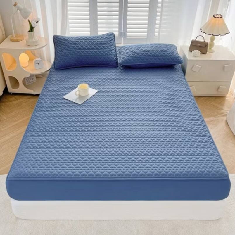 Huitich fitted sheets in blue on bed with waterproof king size mattress topper and matching pillows