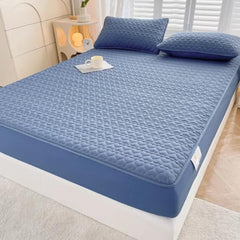 Huitich fitted sheets on bed with waterproof king size mattress topper in blue quilted design