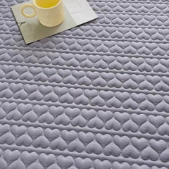 Huitich fitted sheets close-up on grey waterproof king size mattress topper with heart pattern quilting
