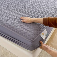 Huitich fitted sheets on a waterproof king size mattress topper with quilted gray fabric