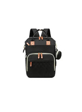 Black maternity backpack with quilted front, top handles, and front zip pocket