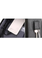 Waterproof travel backpack inner charging pocket with USB power bank and cable