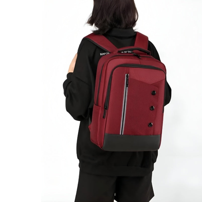 Huitich waterproof travel bag for school in red worn by person with padded straps and multiple compartments