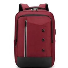Maroon and black waterproof travel backpack with top handle, front panel buttons, and zipper