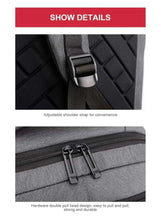 Light grey backpack with adjustable shoulder strap and double-pull zipper hardware