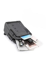 Light grey backpack laid open, showing inner pockets for tablet and devices