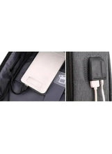 Light grey backpack with USB charging port and side cable pass-through pocket