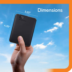 Western Digital reliable backup storage device held in hand showing dimensions 4.35 by 3.23 inches