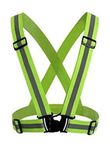 Green X-back safety harness with black straps and buckles