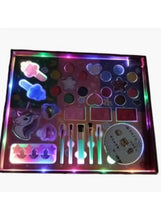 Girls beauty set case with colorful makeup palette, unicorn designs, and compact mirror