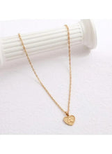 Gold letter A heart pendant necklace with slim chain, pendant centered