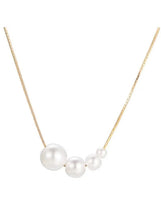 Gold tone pearl cluster pendant necklace with white round pearls on thin chain