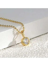 Gold beaded pendant necklace with small round crystal drop on chain