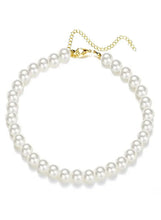 White pearl necklace with gold-tone clasp, round beads in a single row
