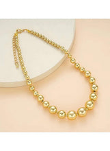 Gold tone pearl bead necklace with round ball beads and chain links