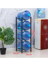 Black vertical four-tier bottle rack with blue jugs; shows 33 cm and 34 cm marks.