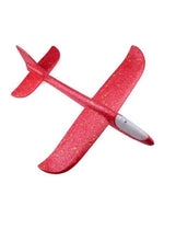 Red glitter foam flying glider plane with LED light, hand-launch toy, side view