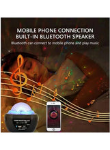 Black star projector light with smartphone remote and clear dome