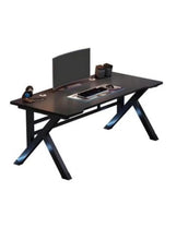 Black computer desk with thick tabletop and K-shaped steel frame, side view