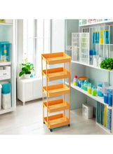 Yellow 5-tier plastic storage trolley with open shelves on caster wheels in a corner